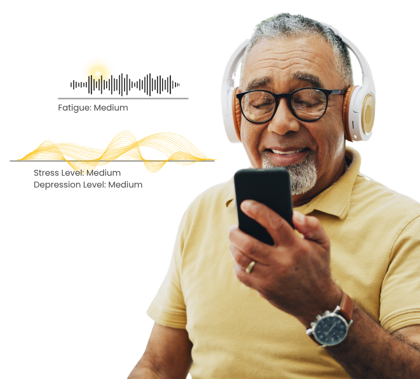 Elderly man with headphones on with voice biomarkers that indicate fatigue, stress, and depression